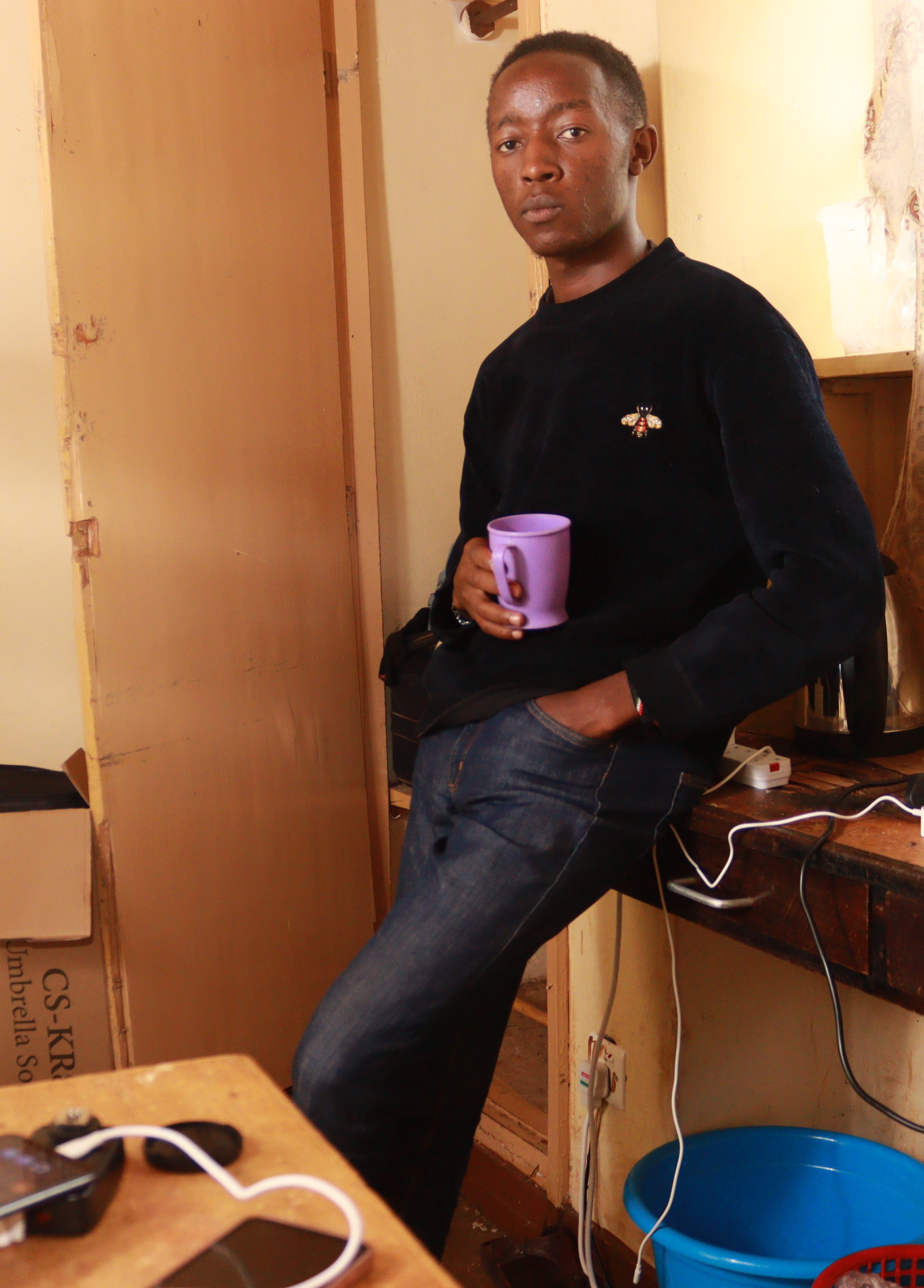 Kenyan educator teaching kids IT